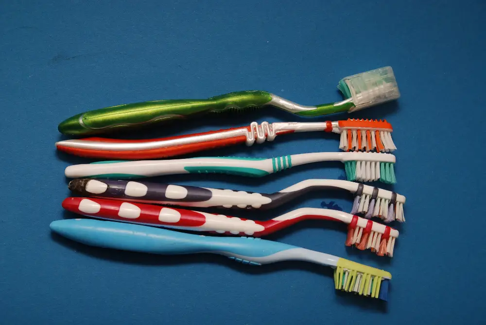 Toothbrushes lined up 
